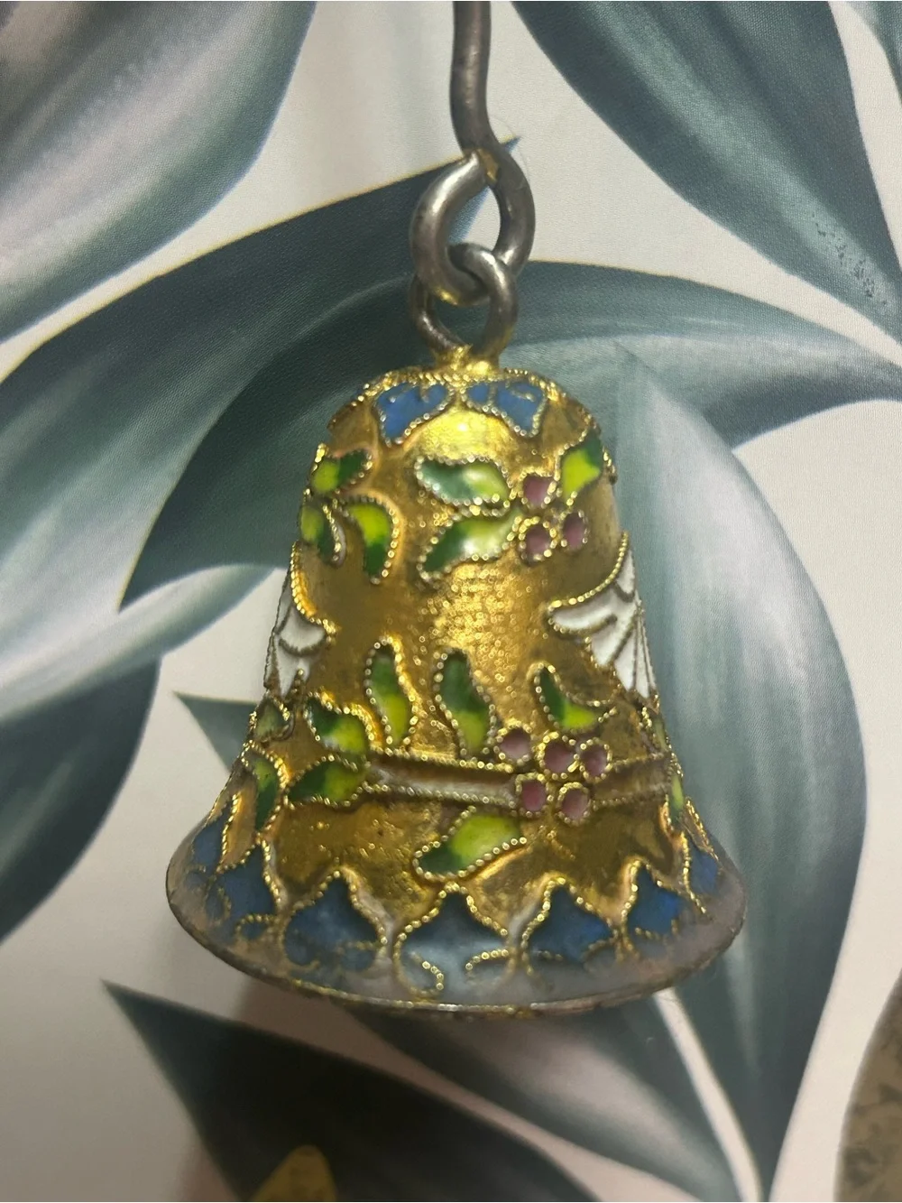 This is a Vintage Cloisonné Enamel Candle Snuffer.